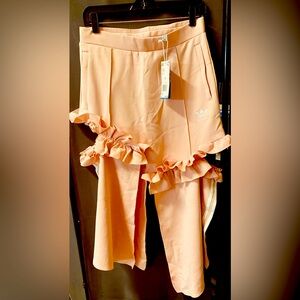 Adidas J KOO Pink peachy color size Small